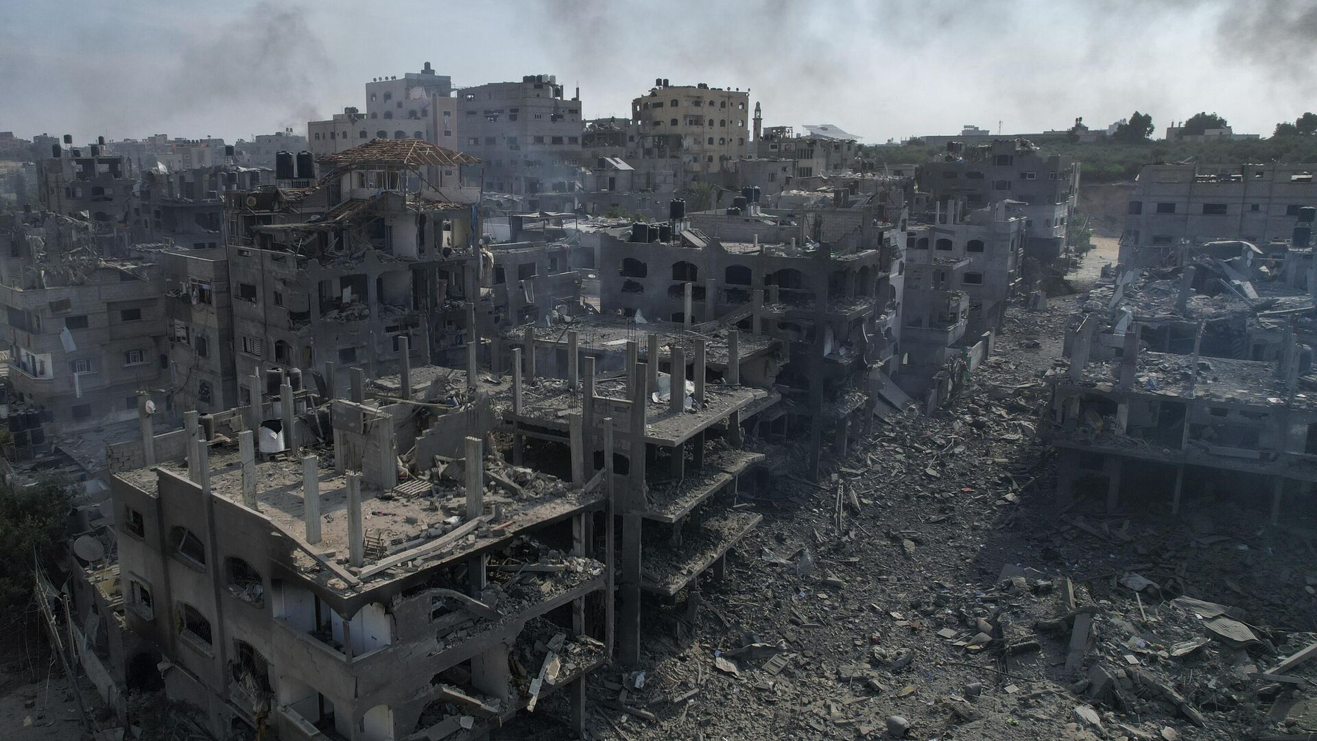 Poh?ad na trosky budov zasiahnutých izraelským náletom, v Jabalia, pásmo Gazy, streda, 11. októbra 2023 - Sputnik International, 1920, 24.09.2024