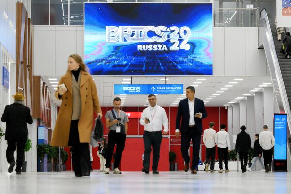 Návštevníci sa zúčastňujú na 16. samite BRICS v Kazani v Rusku. Návštevníci sa zúčastňujú na 16. samite BRICS v Kazani v Rusku. - Sputnik International